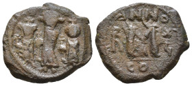 Heraclius, with Martina and Heraclius Constantine. 610-641. AD AE Follis. Constantinople mint, 4th officina. Dated RY 16 (625/6) AD. Heraclius, in cen...