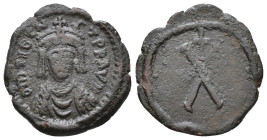Tiberius II Constantine. 578-582 AD. Decanummium. Constantinople. δ m Tib CONTAN P P Crowned, draped, and cuirassed bust facing. Rev. Large X, cross a...
