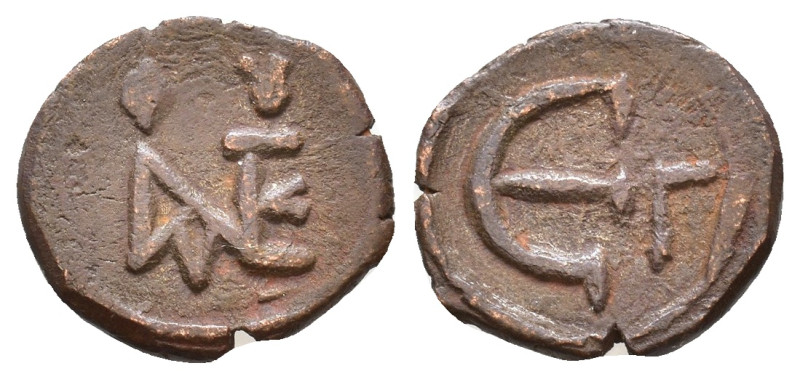 Justin II, 565-578 AD. Pentanummium. Constantinople. Monogram of Justin II. Rev....