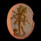 INTAILLE
Sur cornaline figurant Mars Gravidus debout, de profil v. la gauche avec ses attributs. Ligne de base. Léger éclat sur le bord. 
9 x 12 x 2...