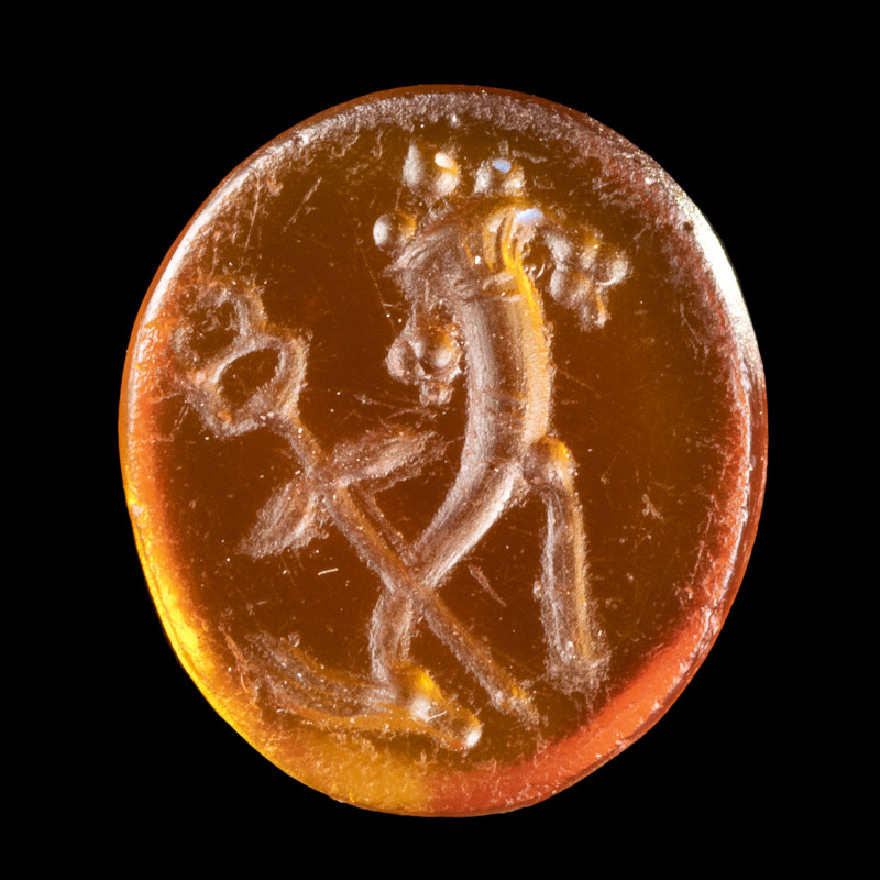 INTAILLE
Sur cornaline figurant une sorte d'emblème composé d'une cornucopia, l...