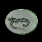 INTAILLE
Sur jaspe vert figurant une crevette de profil v. la gauche. 
9 x 11 x 2 mm. 
Art romain, Ier-IIe siècle. 

A Roman green jasper intagli...