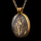 LARGE PENDENTIF AVEC ENCOLPION CHRISTIQUE
En or. Le médaillon est constitué de deux lentilles de cristal de roche, dont l'une est gravée en intaille,...