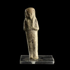 USHABTI
En faïence, dans sa gaine mommiforme; perruque tripartite. Anépigraphe. 
H. 9 cm. 
Egypte, Basse-Epoque, 664-332 av.J.-C.

Provenance : C...