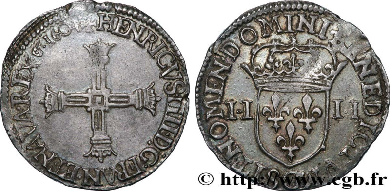 HENRY IV
Type : Quart d'écu, croix batonnée et couronnée de face 
Date : 1604 
M...