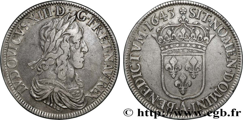 LOUIS XIII
Type : Écu d'argent, 3e type, 2e poinçon de Warin 
Date : 1643 
Mint ...