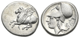 CORINTHIA. Corinth. Circa 375-300 BC. Stater (Silver, 21 mm, 8.53 g). Ϙ Pegasos flying left. Rev. Head of Athena to left, wearing Corinthian helmet; b...