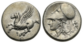 CORINTHIA. Corinth. Circa 375-300 BC. Stater (Silver, 21 mm, 8.54 g). Ϙ Pegasos flying left. Rev. Helmeted head of Athena to left; flanking neck, Δ-I;...