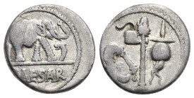 Iulius Caesar, 49-48 BC. Denarius (Silver, 17.50 mm, 3.85 g). Military mint moving with Caesar. Culullus, aspergillum, axe and apex. Rev. Elephant rig...