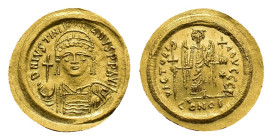 Justinian I, 527-565. Solidus (Gold, 22.75 mm, 4.48 g). Constantinopolis, 545-565. DN IVSTINI ANVS PP AVI Cuirassed bust of Justinian facing, wearing ...