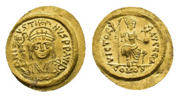 Justin II, 565-578. Solidus (Gold, 20.99 mm, 4.46 g). Constantinopolis, 567-578. DNI USTI NVS PP AVI Cuirassed bust of Justin facing, wearing crested ...