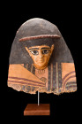 EGYPTIAN LARGE MUMMY MASK

 Late Ptolemaic Period - early Roman Period, ca. 100-1BC
 The upper portion of the mask is adorned with a striking black...