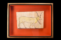 EGYPTIAN WOODEN PANEL WITH SACRED COW HESAT

 Ptolemaic Period, ca. 332-31 BC
 A rectangular wooden panel, possibly from a coffin, displaying a fin...