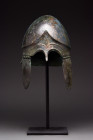 GREEK BRONZE CHALCIDIAN HELMET

 Ca. 500-300 BC
 A bronze helmet with a hemispherical dome, which provided a protective covering for the wearer's h...
