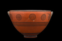 CYPRIOT BLACK ON RED WARE POTTERY BOWL

 Cypro-Archiac, Ca. 750-600 BC
 A beautiful thin-walled bowl of slightly elliptical form, with twin handles...