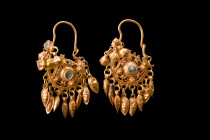 PAIR OF GREEK HELLENISTIC GOLD EARRINGS

 Ca. 4th-3rd century BC
 A stunning pair of gold earrings, showcasing an elegant combination of design ele...
