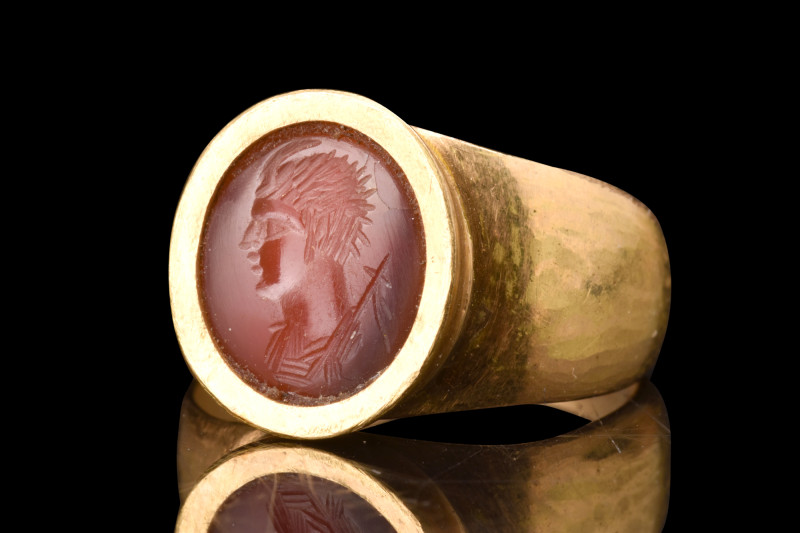 ROMAN MERCURY INTAGLIO IN GOLD RING

 Ca. 1-200 AD
 A carnelian intaglio set ...