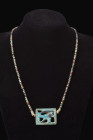 PHARAONIC FAIENCE NECKLACE WITH EYE OF HORUS

 Late Period, ca. 664-332 BC 
 A multi-coloured faience pendant necklace centred with a superior Eye ...
