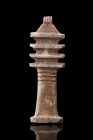 EGYPTIAN FAIENCE DJED PILLAR AMULET

 Ca. 664-332 BC
 A pale turquoise faience amulet of the Djed pillar. The front is marked vertically between ea...