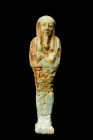 EGYPTIAN FAIENCE USHABTI

 Late Period, Ca. 664-332 BC
 An ushabti with a mummy-shaped body and a prominent back pillar, standing gracefully upon a...