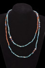 PHOENICIAN BEADED NECKLACE

 Ca. 300 BC
 A restrung beaded necklace composed of variously shaped glass beads in vibrant hues of red, blue, and gree...