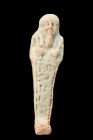 EGYPTIAN FAIENCE USHABTI

 Late Period, Ca. 664-332 BC
 Crafted from light faience, the ushabti with a mummiform style, stands atop a diminutive an...