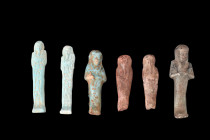 EGYPTIAN GROUP OF SIX USHABTIS

 Late Period to Ptolemaic Period, ca. 664-30 BC
 A group of six captivating ushabtis, each meticulously fashioned f...