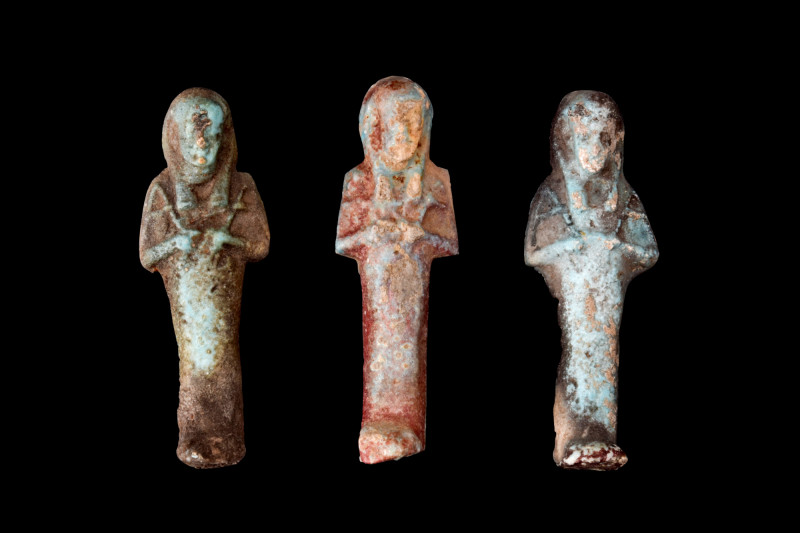 COLLECTION OF THREE EGYPTIAN FAIENCE USHABTIS

 Late Period, 30th Dynasty, Ca....