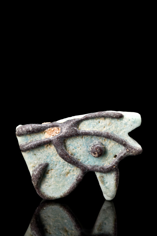 EGYPTIAN FAIENCE WEDJAT-EYE AMULET

 Ca. 1070-664 BC
 A faience amulet depict...