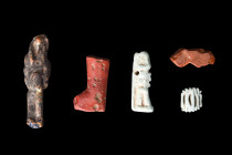 EGYPTIAN SELECTION OF AMULETS

 Ca. 1550-332 BC
 A group of ancient Egyptian amulets in a variety of materials, from left a faience amulet of the I...