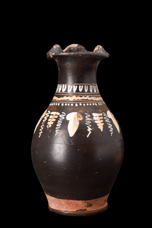 GNATHIAN BLACK-GLAZE POTTERY JUG

 Ca. 340-320 BC
 An attractive blackware oi...