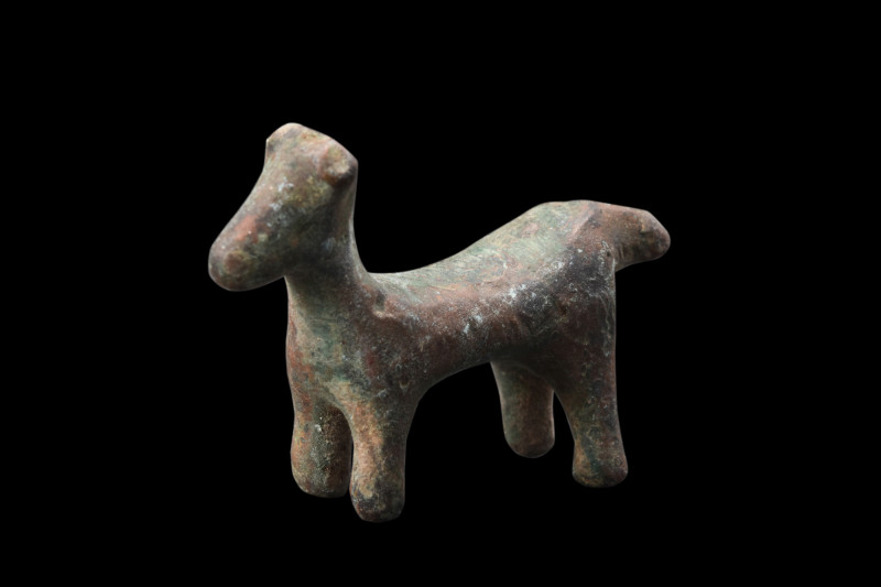 ROMAN BRONZE DOG FIGURINE

 Ca. 100-300 AD
 A bronze dog figurine depicts a d...