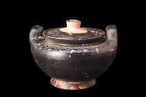 GREEK BLACK-GLAZE LEBES GAMIKOS WITH LID

 Ca. 400-200 BC
 A black glazed lebes gamikos, a rare and remarkable ceramic vessel, showcases a distinct...