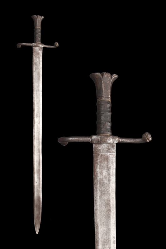 MEDIEVAL IRON SWORD

 Ca. 1400-1500 AD
 An iron sword comprising of a broad t...