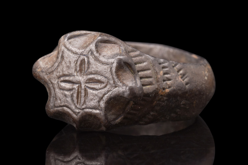 CRUSADERS ERA BRONZE RING WITH CROSS

 Ca. 1100-1400 AD
 A bronze finger ring...