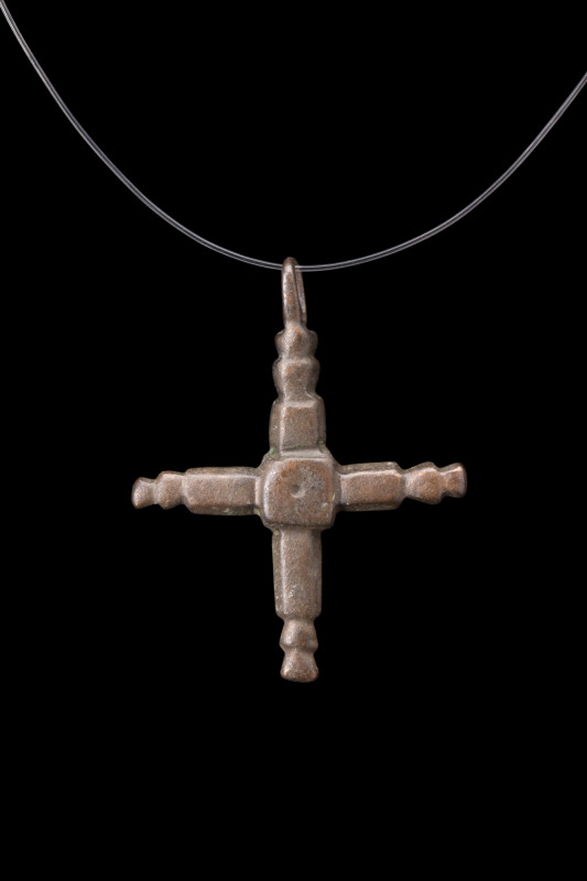 MEDIEVAL BRONZE CROSS PENDANT

 Ca. 1100-1300 AD
 An intricately crafted bron...