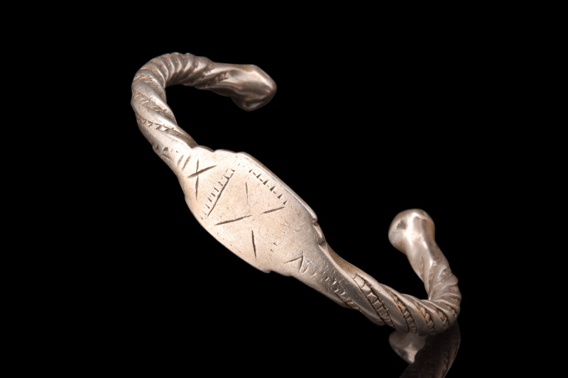 SELJUK SILVER BRACELET WITH TWISTED SHANK

 Ca. 1100-1200 AD
 A silver bracel...