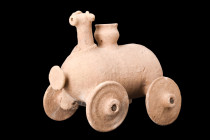 NEAR EASTERN POTTERY RAM-HEADED PULL TOY

 Ca. 3rd millennium BC
 A ram-headed pull toy constructed from pottery, this item stands out for its dist...