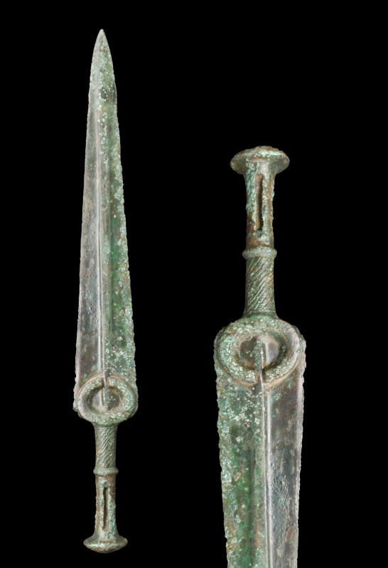 ANCIENT BRONZE DAGGER

 Western Asiatic/Aegan, ca. 1200-700 BC
 A bronze dagg...