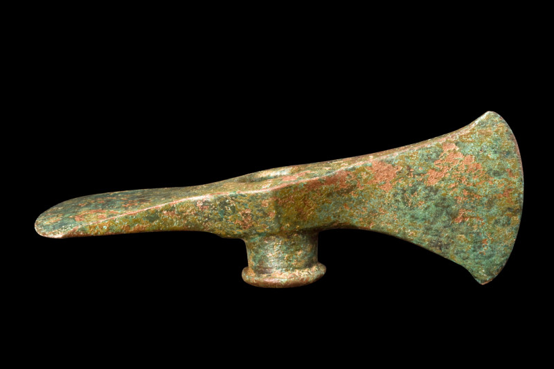 BRONZE AGE BRONZE AXE WITH ADZE

 Ca. 1200-900 BC
 A cast bronze double axe h...