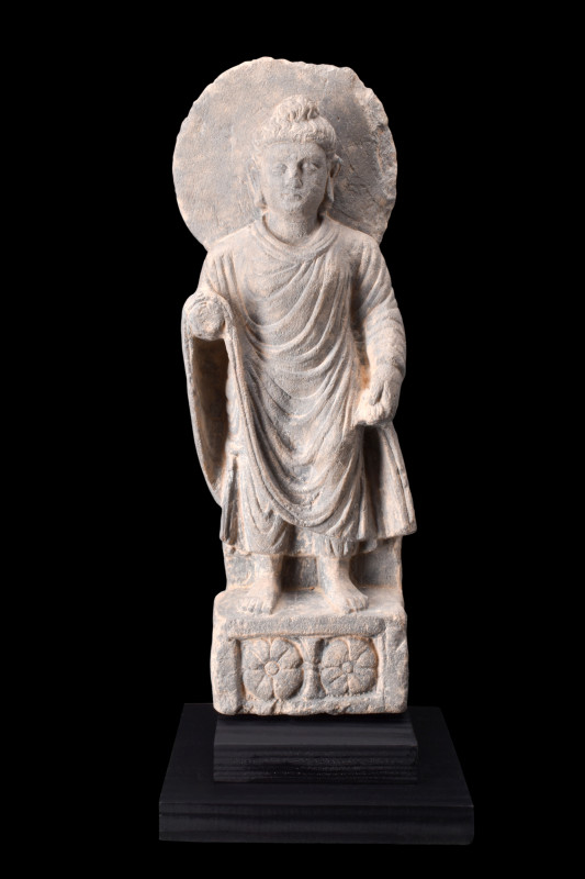 GANDHARAN SCHIST STANDING BUDDHA

 Ca. 200-300 AD
 A schist figure of a stand...