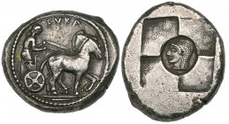 Syracuse, tetradrachm, c. 500 BC, ΣΥΡΑ, slow quadriga driven right by charioteer holding reins in both hands, rev., head of Arethusa left in oval fram...
