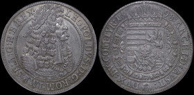 AUSTRIA: 1 Thaler (1698) in silver. Old laureate bust facing right in inner circle on obverse. Crowned arms within Order chain on reverse. Inside slab...