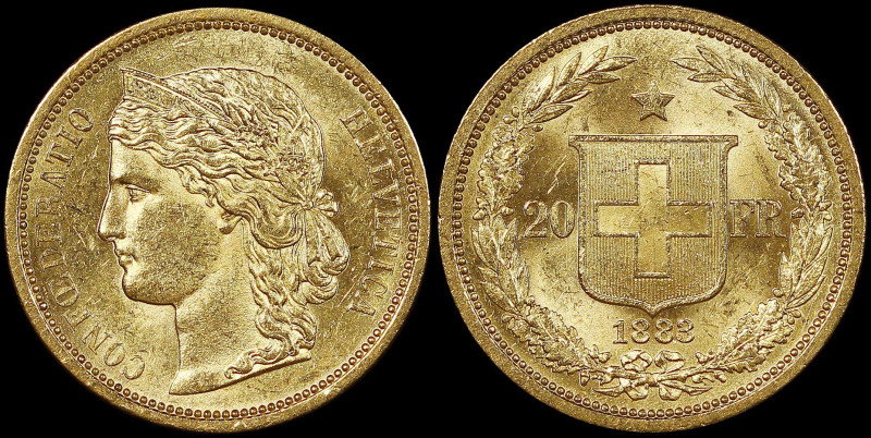 SWITZERLAND: 20 Francs (1883) in gold (0,900). Crowned head of Helvetia facing l...