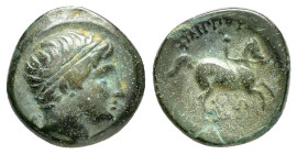 KINGS of MACEDON. Philip II.(359-336 BC).Uncertain mint in Macedon.Ae.

Obv : Diademed head of Apollo right; A to left.

Rev : ΦIΛIΠΠOY.
Youth on hors...