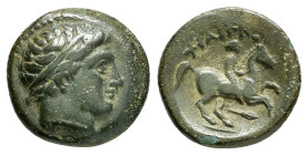 KINGS of MACEDON. Philip II.(359-336 BC).Uncertain mint in Macedon.Ae.

Obv : Diademed head of Apollo right.

Rev : ΦIΛIΠΠOY.
Youth on horseback right...