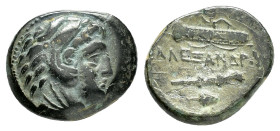KINGS of MACEDON. Alexander III The Great.(336-323).Macedonian mint.Ae.

Obv : Head of Herakles right, wearing lion skin.

Rev : AΛEΞANΔPOY.
Club and ...