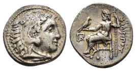KINGS of MACEDON. Philip III Arrhidaios.(323-317 BC).Kolophon.Drachm. 

Obv : Head of Herakles to right in lionskin headdress.

Rev. ΦΙΛΙΠΠΟΥ.
Zeus se...