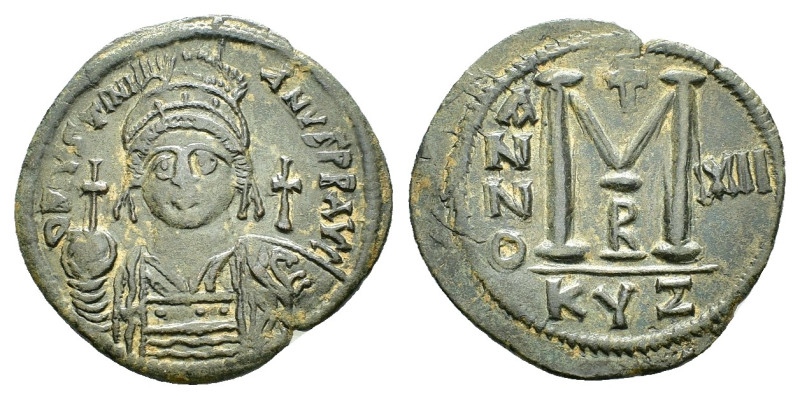 JUSTINIAN I (527-565).Cyzicus. Follis.

Obv : D N IVSTINIANVS P P AVG.
Helmeted ...