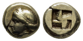 IONIA, Phokaia. 477-388 BC. Electrum Hekte (2.56 Gr. 9mm.).
Female head, hair bound in sakkos, seal behind
Rev. Quadripartite incuse square.
